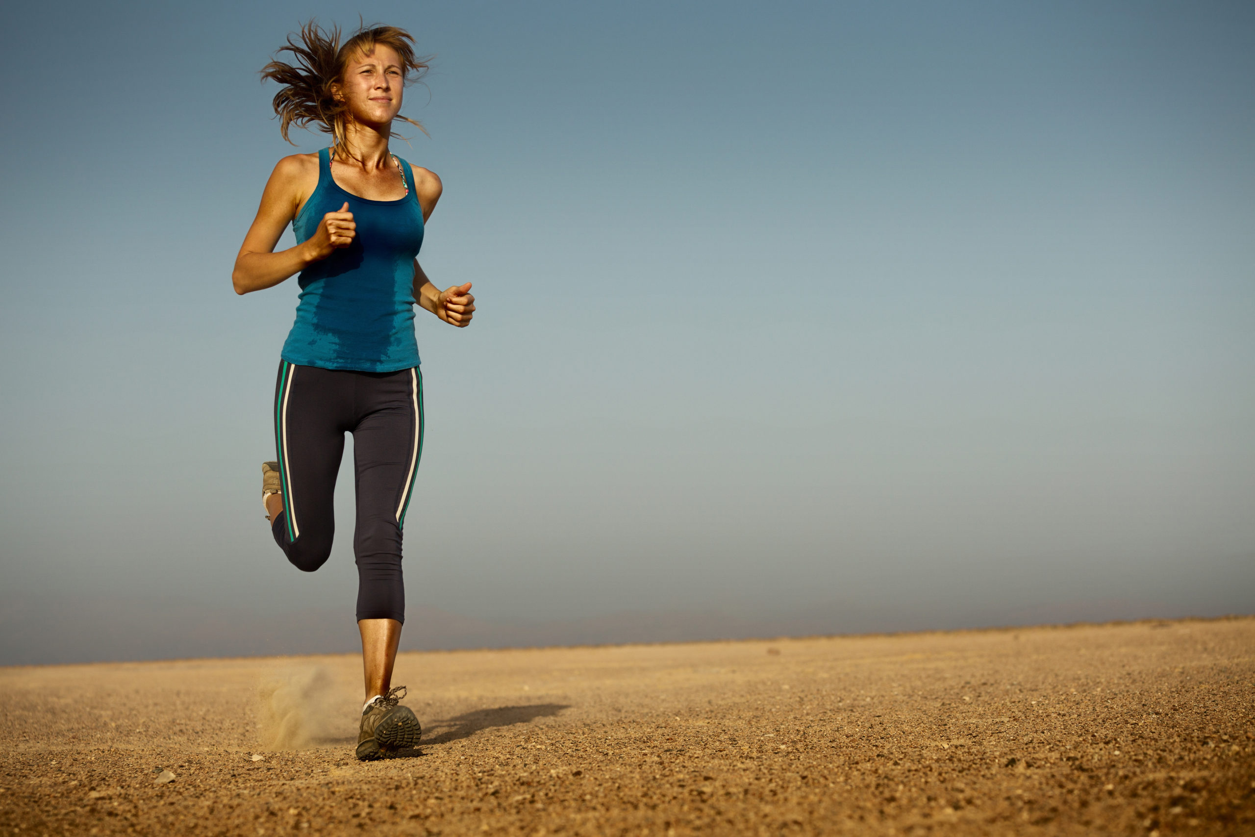 Woman running for aerobic training