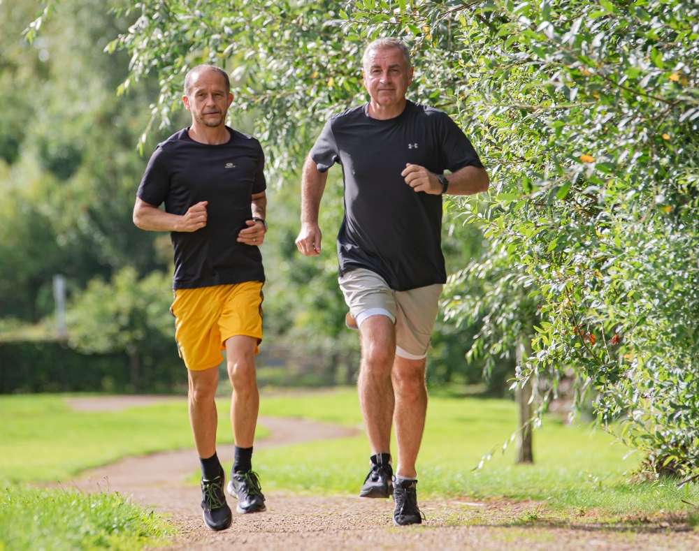 Neil the Coach running with a client